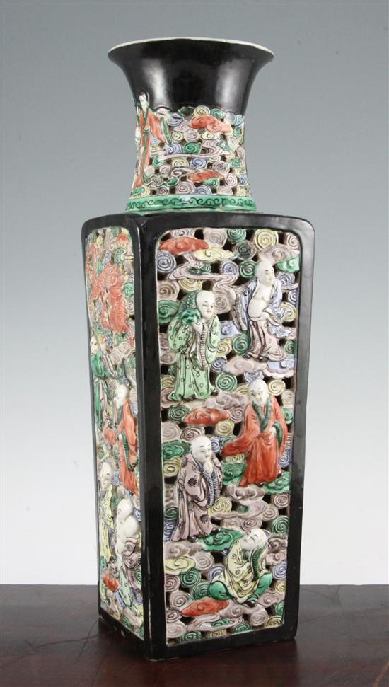 A Chinese double walled famille verte glaze biscuit porcelain vase, Qianlong mark, early 20th century, 44cm., damage to neck